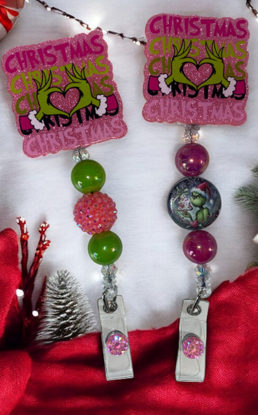 Grinch Hand Hearts Badge Reel